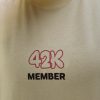 Playera-Over-42K-Member-Beige-B Playera Finisher Maratón CDMX 2025