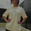 Playera-Over-42K-Member-Beige-C Playera Finisher Maratón CDMX 2025
